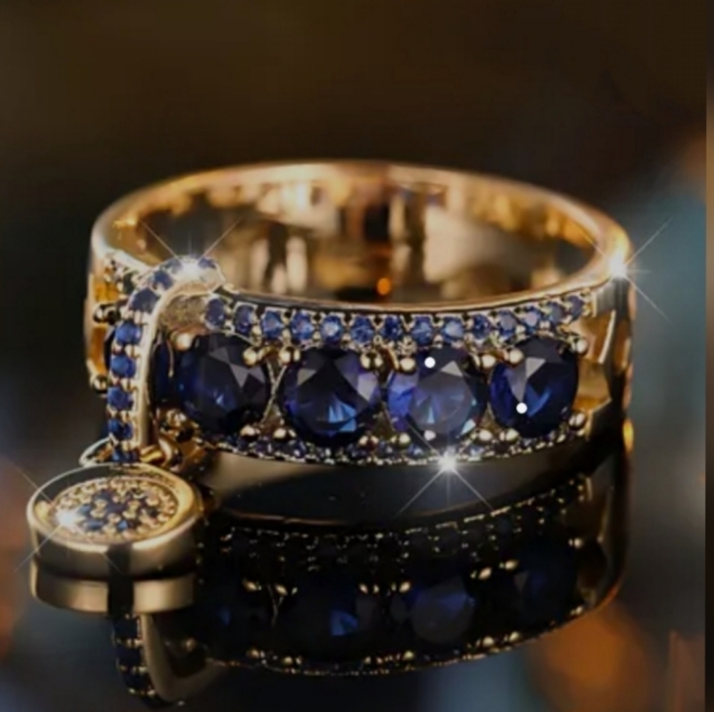 Gold and Sapphire Hanging Disc Pendant Ring